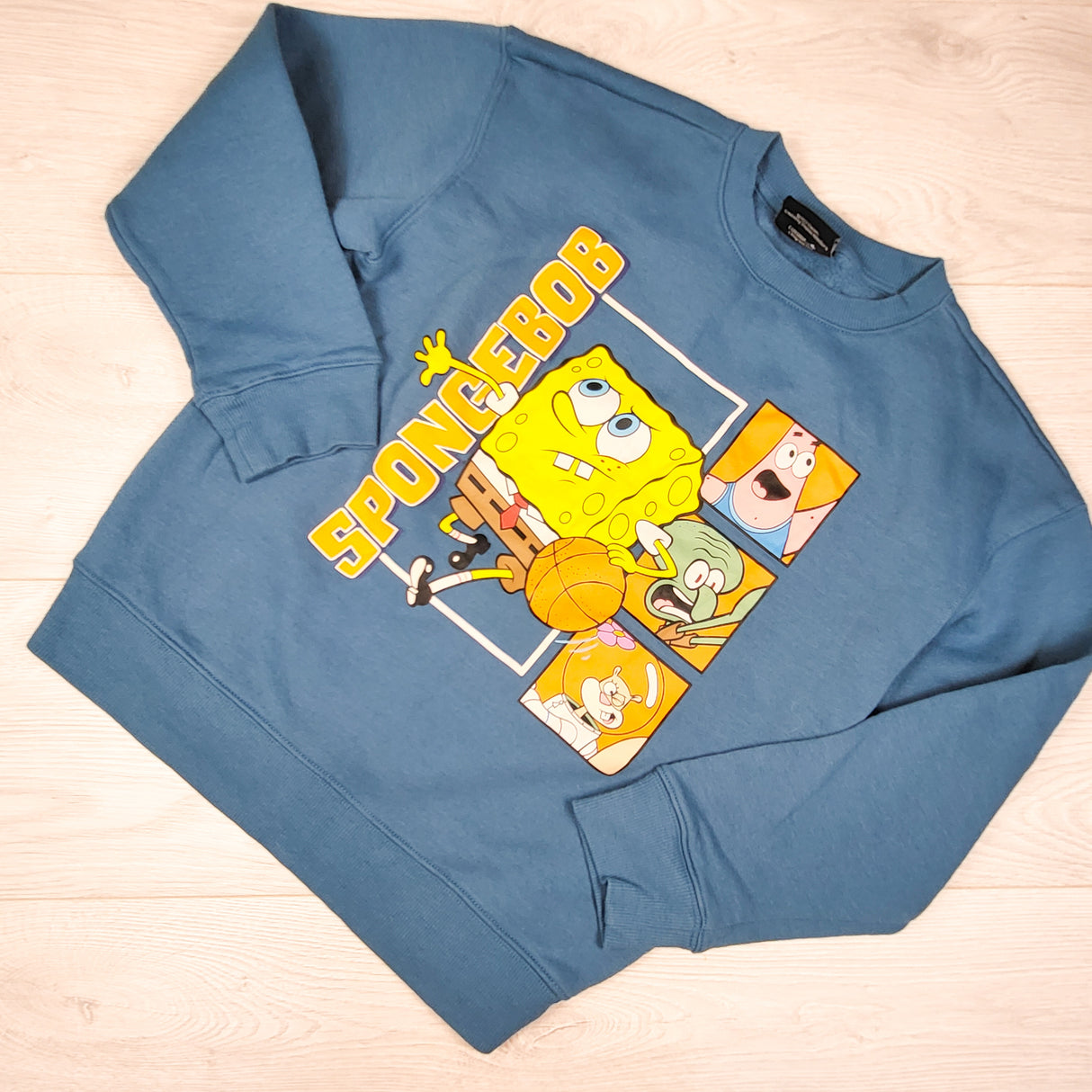 Nikelodeon blue fleecy lined Spongebob Squarepants sweatshirt. Size 10/12