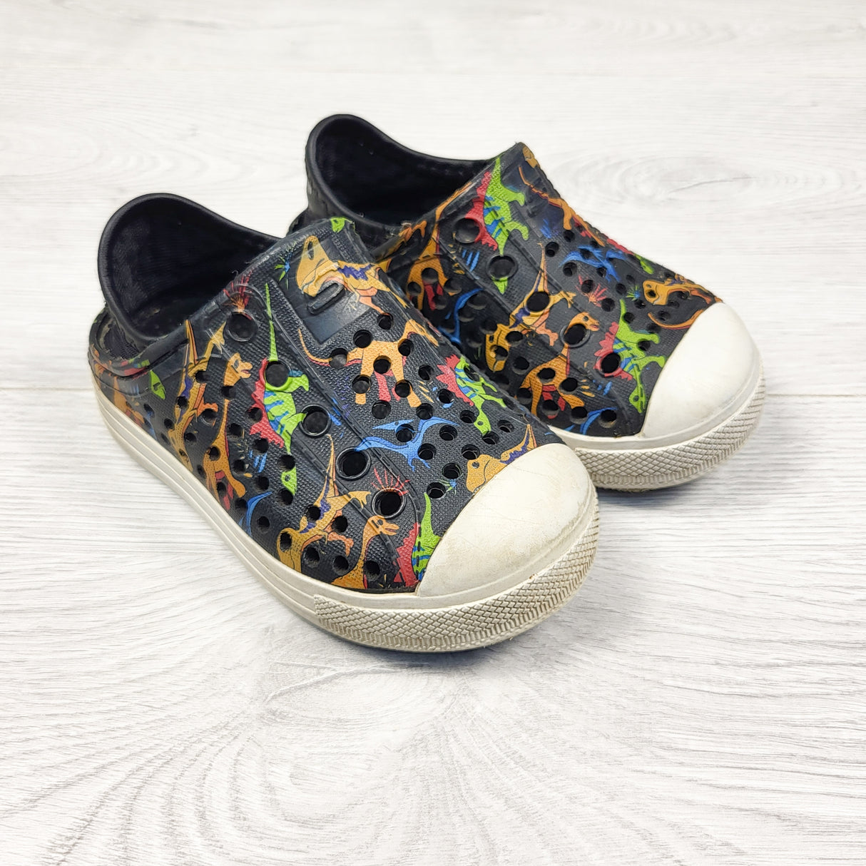 Skechers black dinosaur print clogs. Size 5