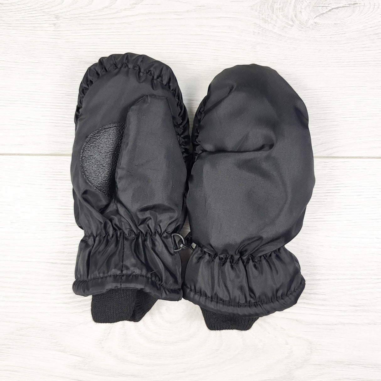 Black mittens. Seem toddler sized