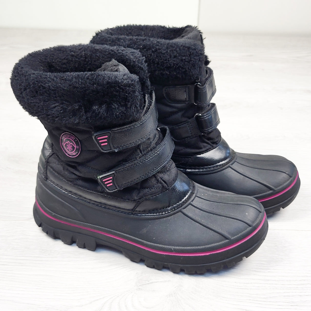 Joe pink and black snow boots. Youth size 5 (sorry, no shipping)