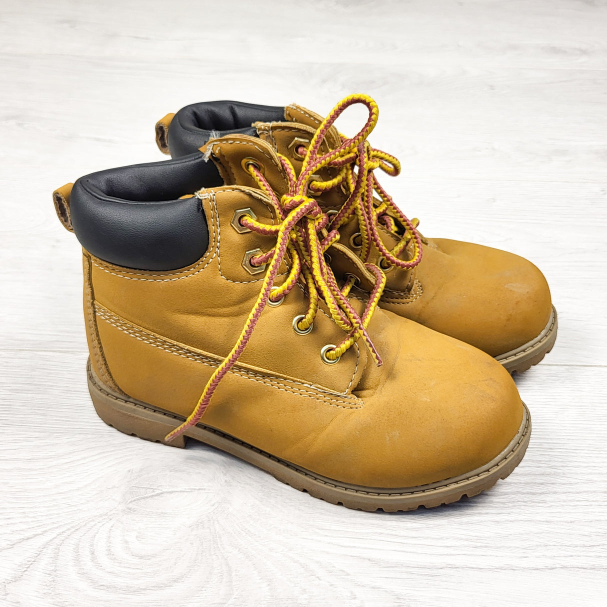 Tan faux leather work style boots. Size 12