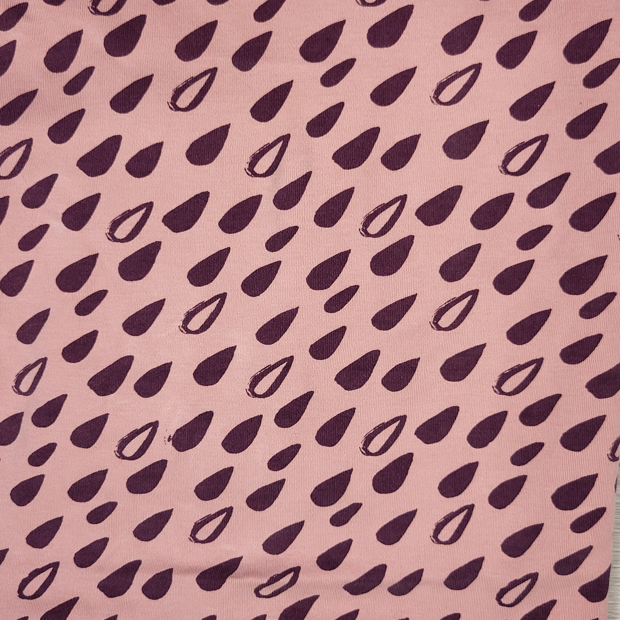 Parade Organics pink organic cotton rain drop pattern "everything" blanket