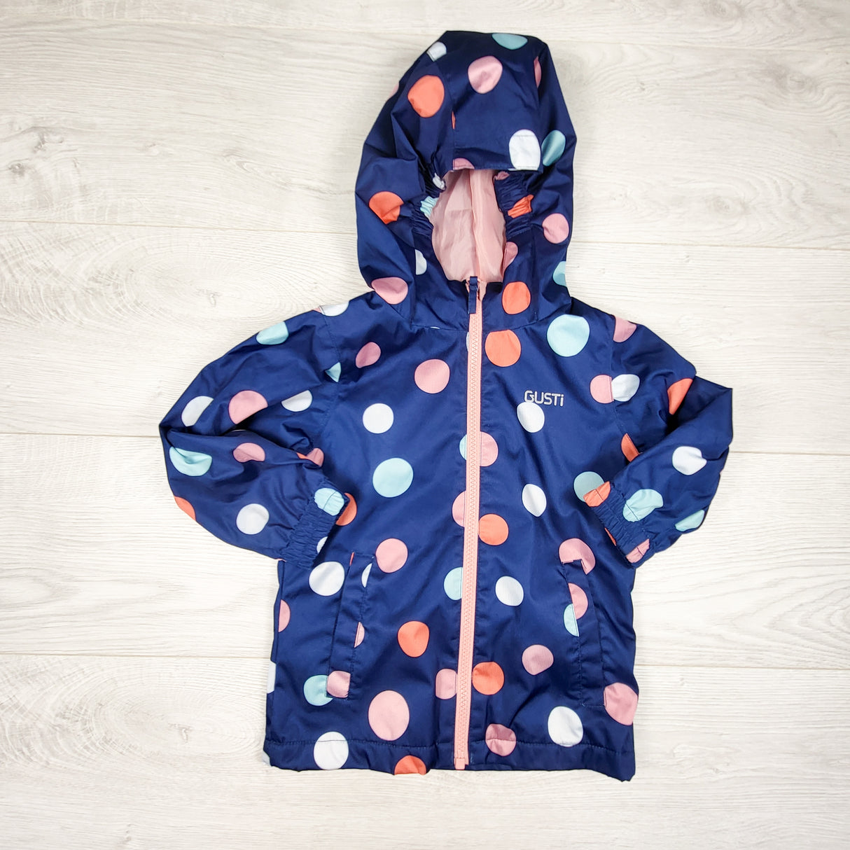 Gusti navy polka dot rain coat. Size 3T