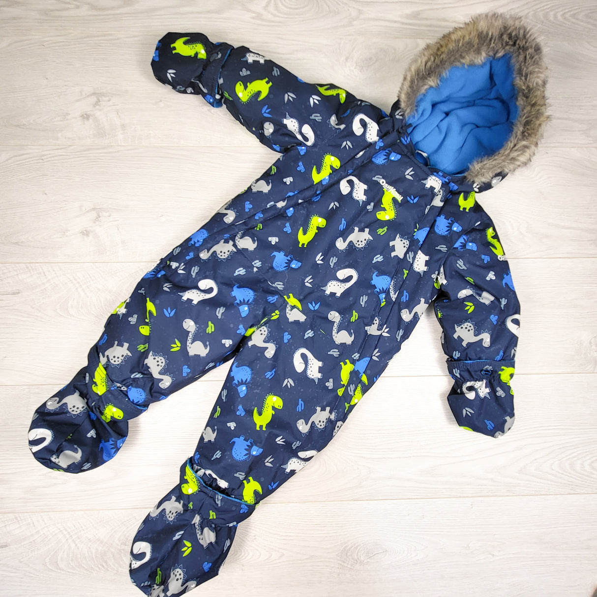 Oshkosh navy dinosaur print fleece lined snowsuit. Size 6-9 months