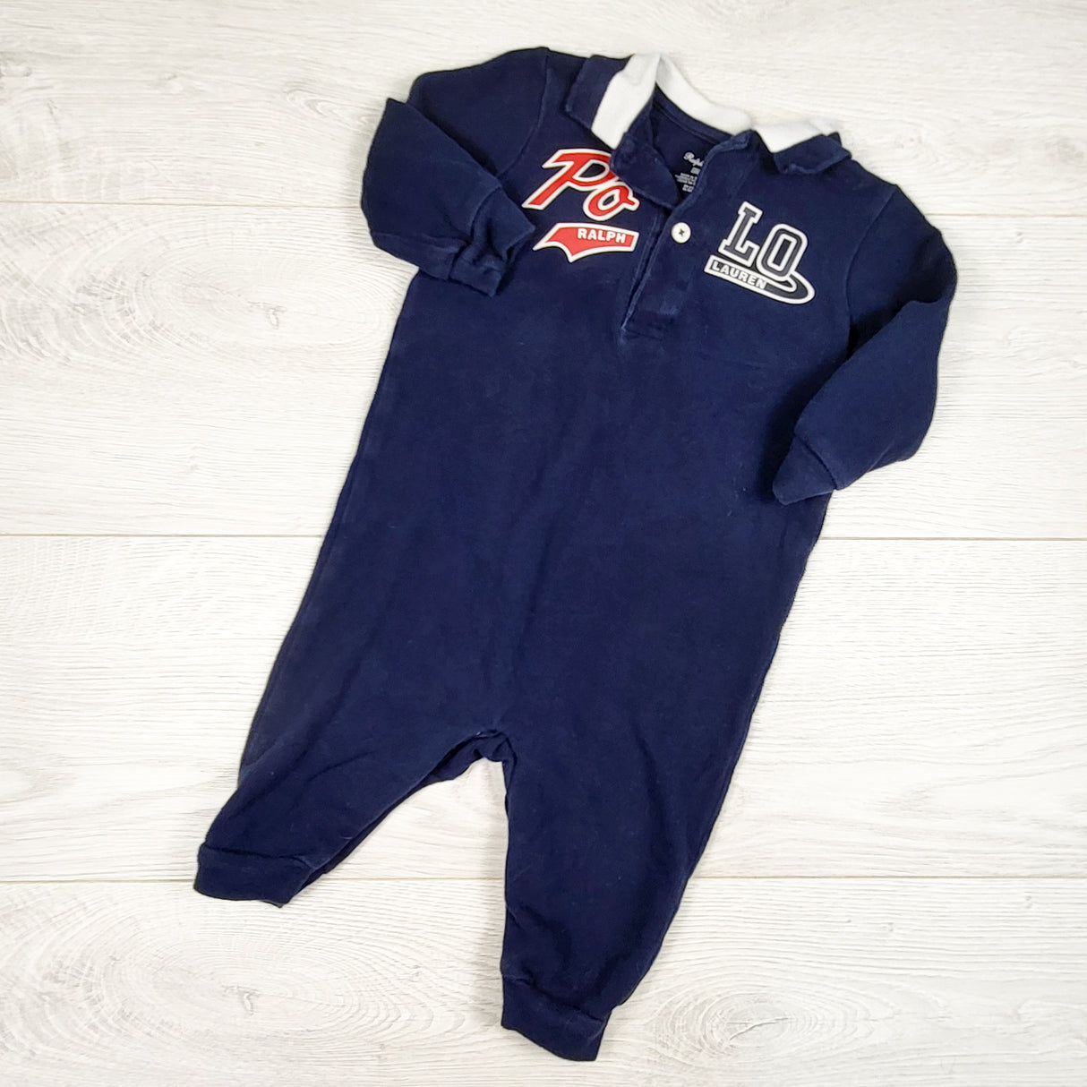 Ralph Lauren navy polo romper. Size 6 months - retails for $80 new