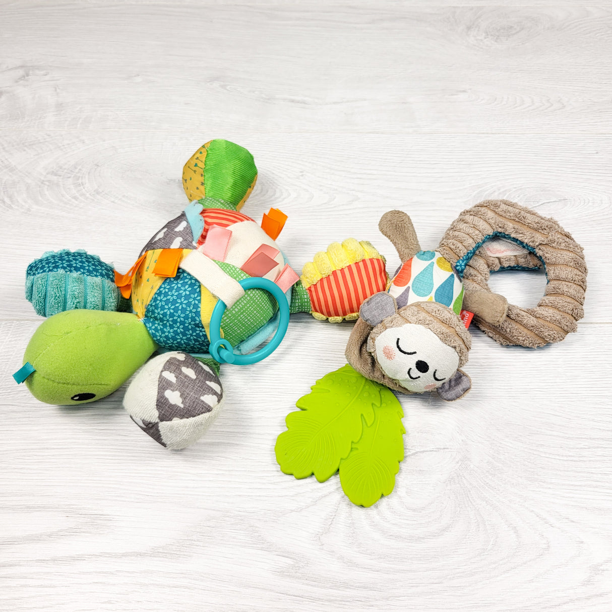 Pair of Infantino stroller toys