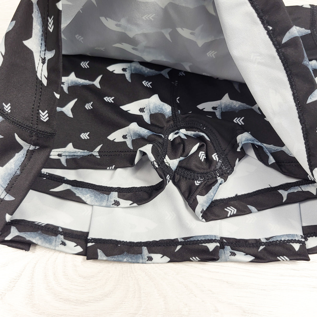 Stonz black shark patterned UPF 50+ swim skort. Size 3T