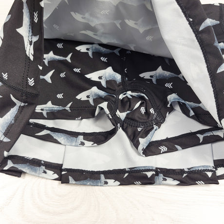 Stonz black shark patterned UPF 50+ swim skort. Size 3T