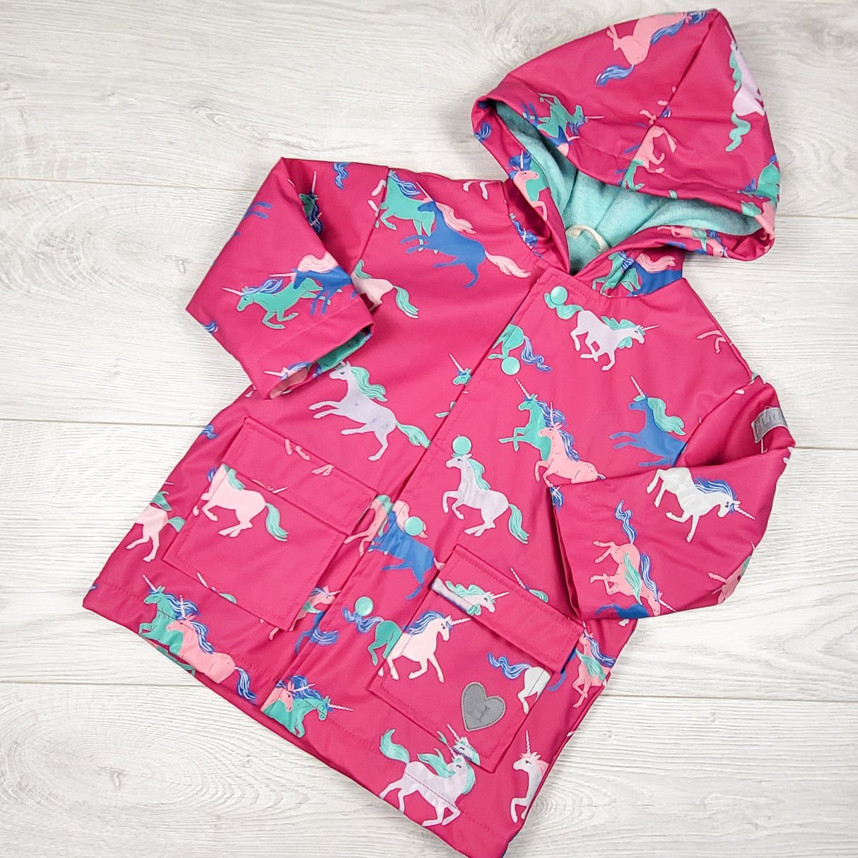 Hatley pink terrycloth lined colour changing unicorn rain jacket. Size 2T