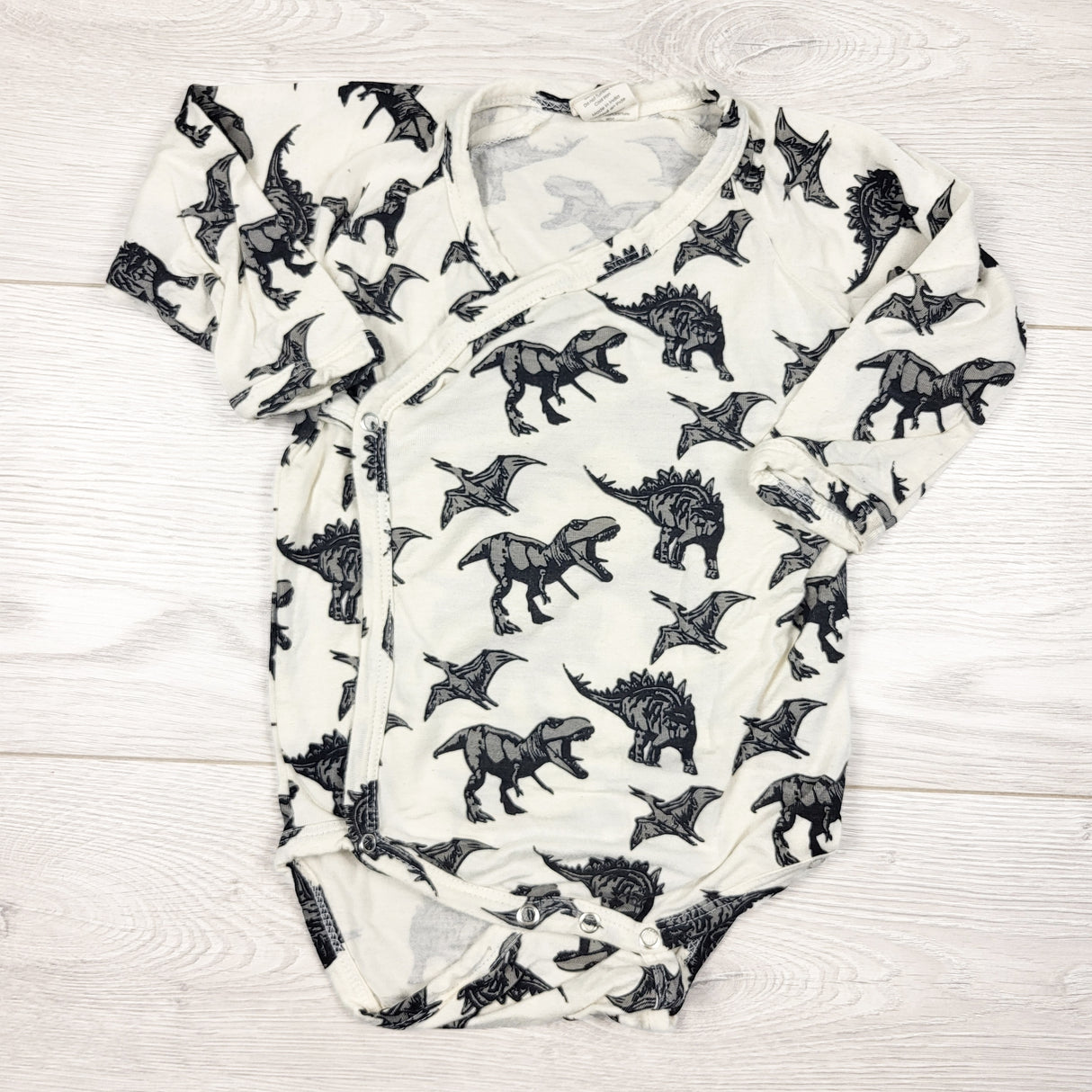 Kate Quinn dinosaur print wrap style bamboo bodysuit. Size 6-12 months