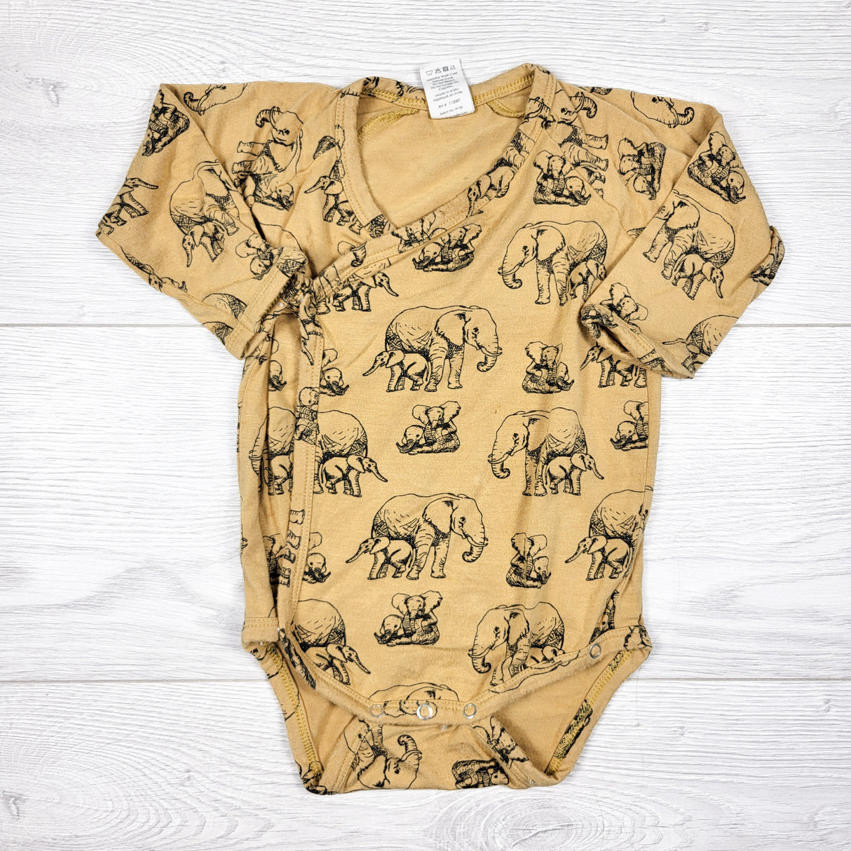 Kate Quinn golden yellow elephant print wrap style bodysuit. Size 6-12 months