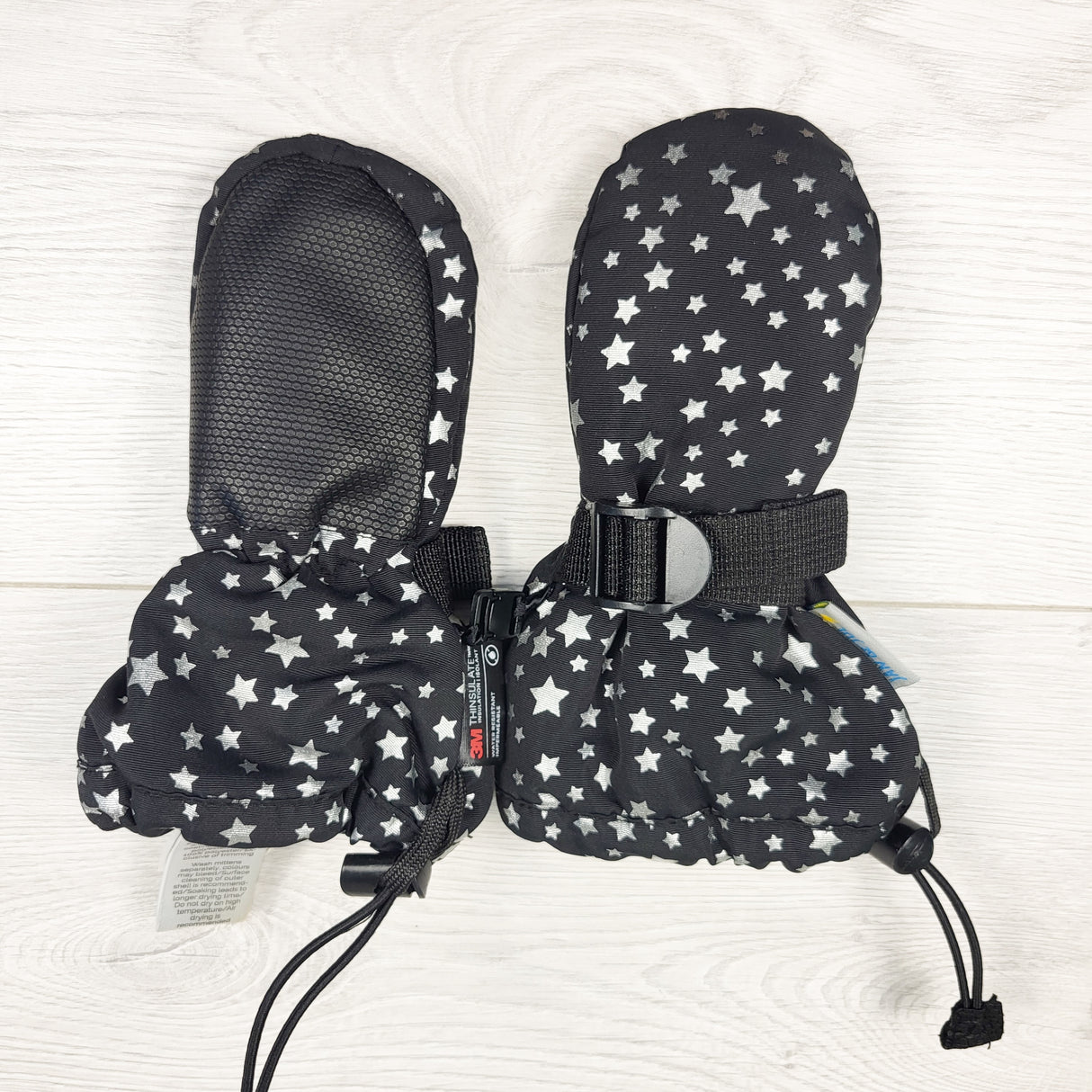 Jan and Jul black star print waterproof mittens. Size XS (0-2 Years)