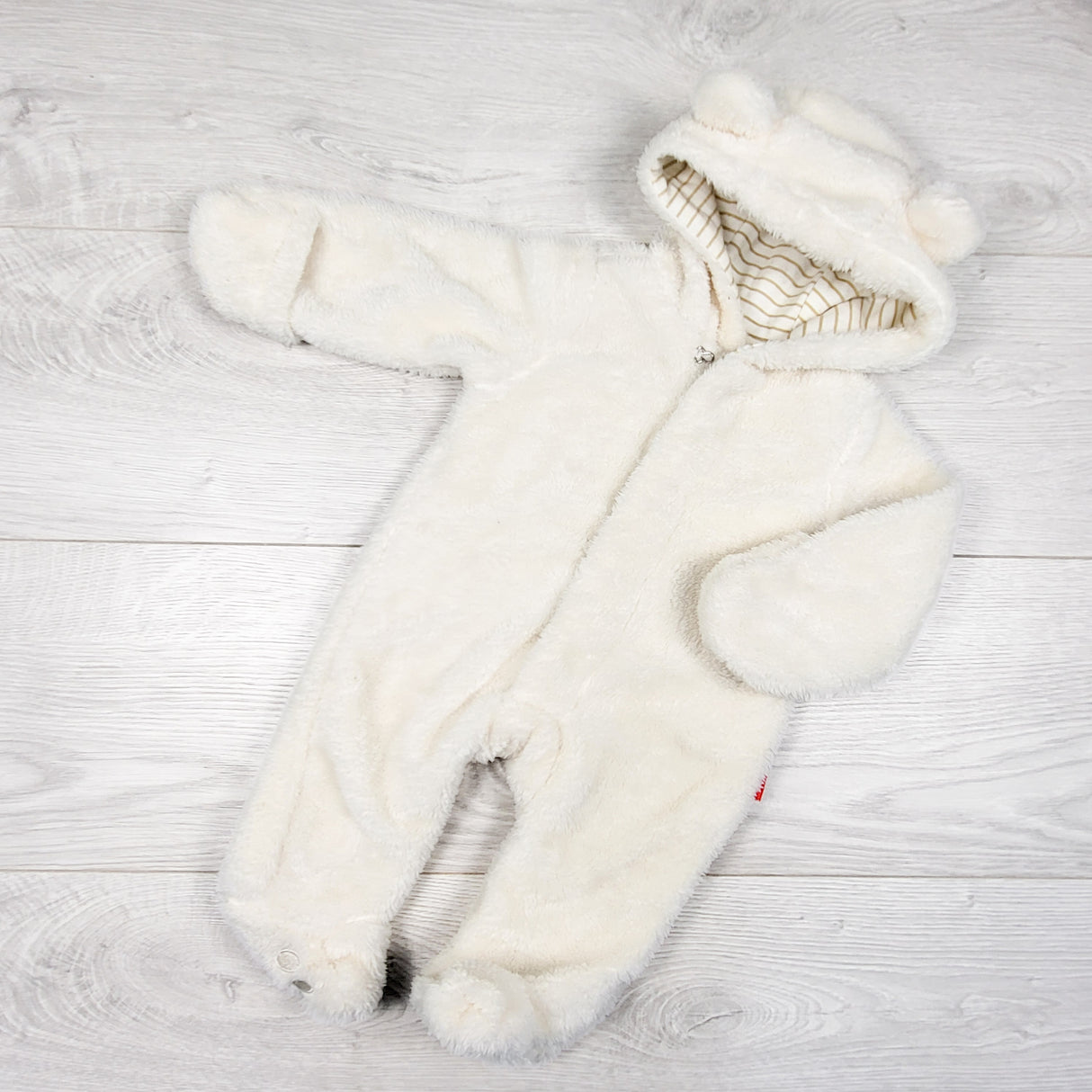 Magnetic Me plush bunting suit with magnetic closures. Newborn size - retails for $100 new