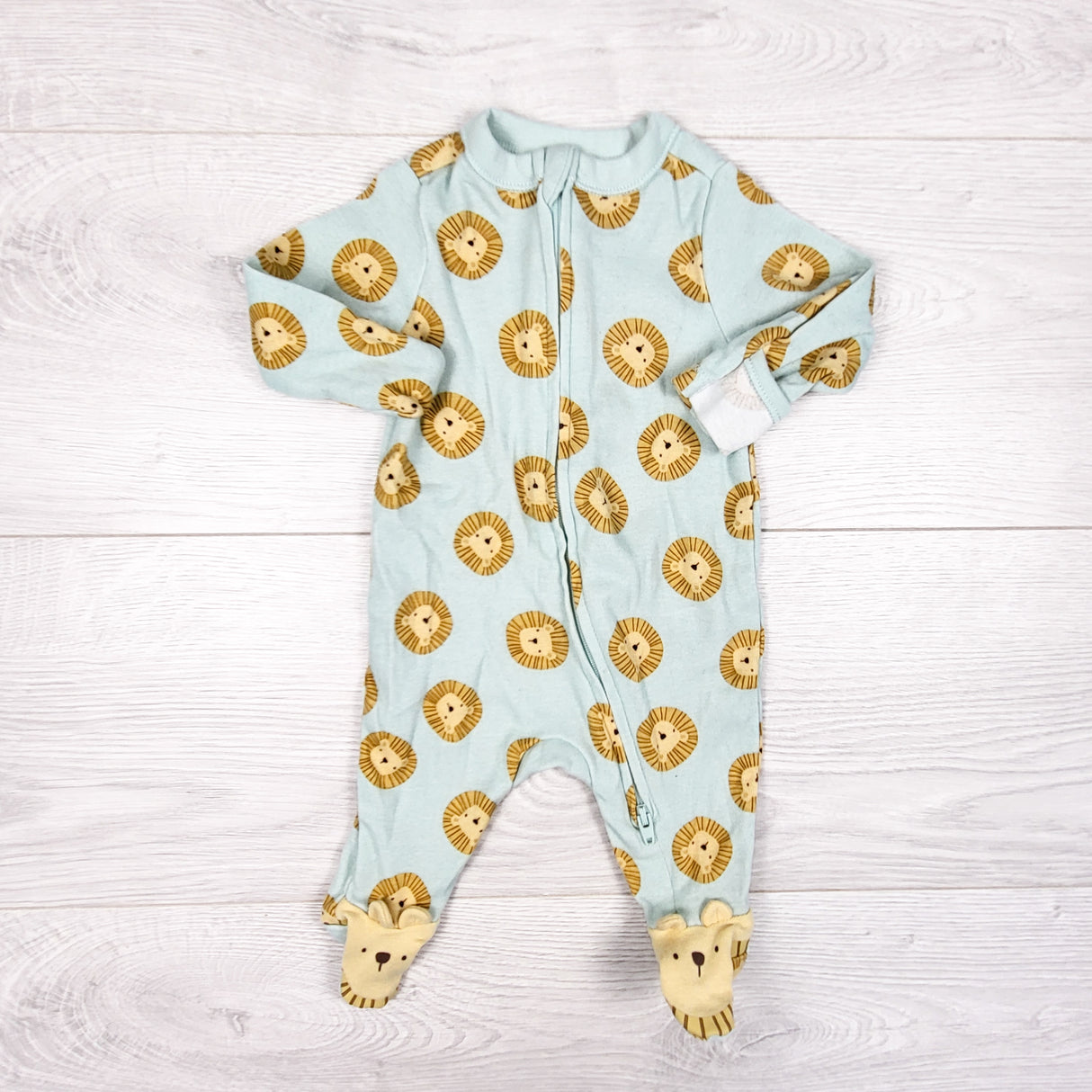 Old Navy mint zippered sleeper with lions. Newborn size