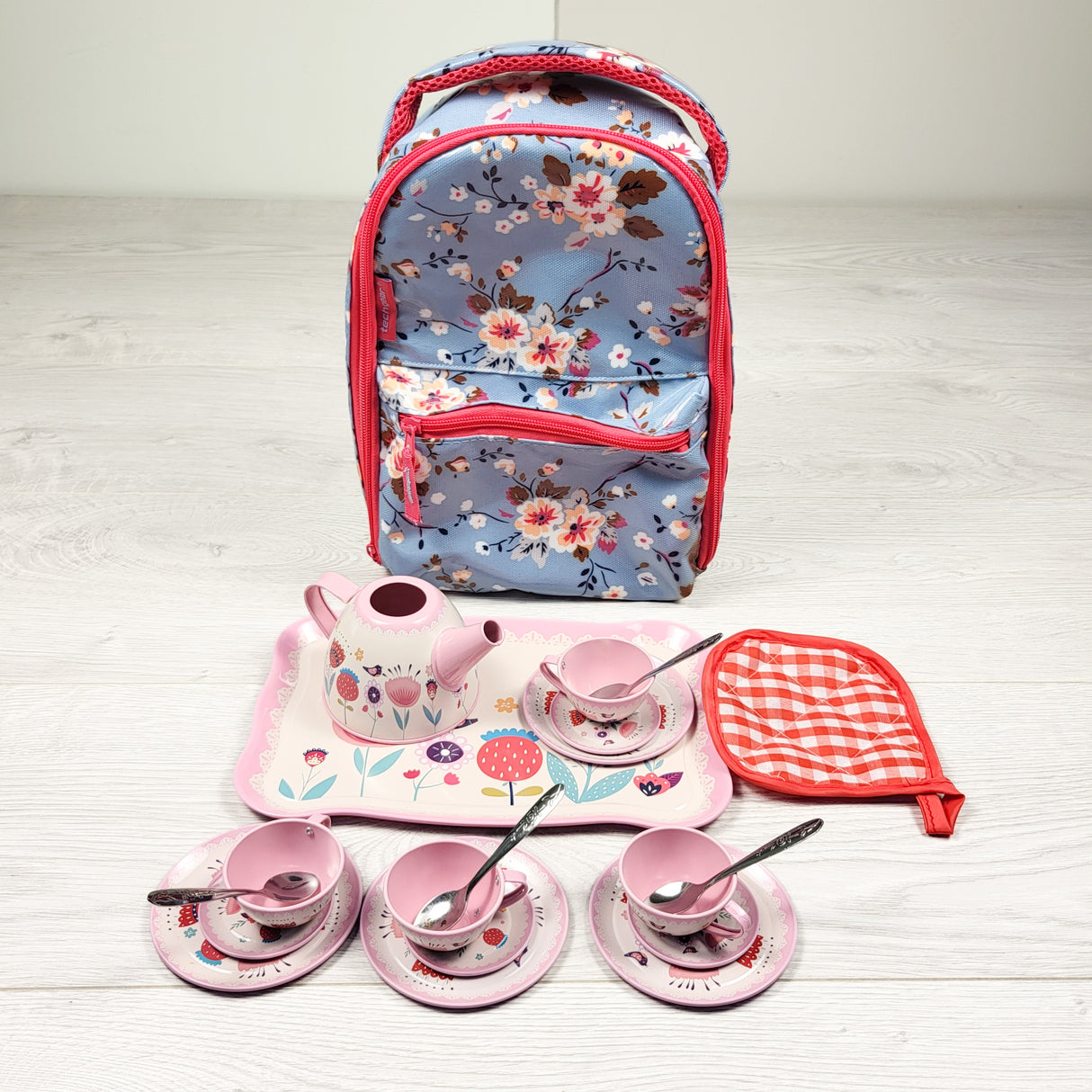 Tin tea set with small floral backpack