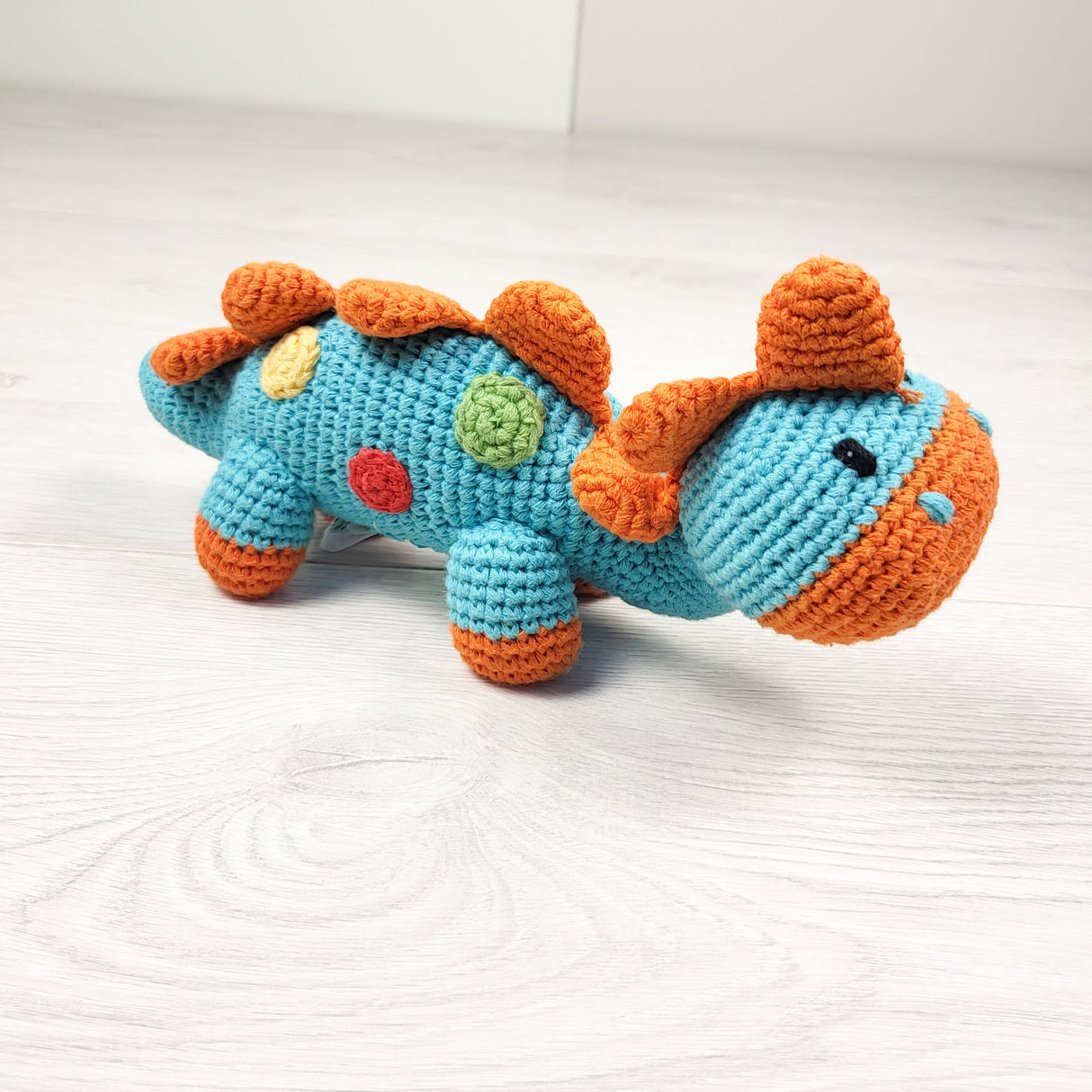 Pebble Handmade Fair Trade Stegosaurus Dinosaur Baby Rattle
