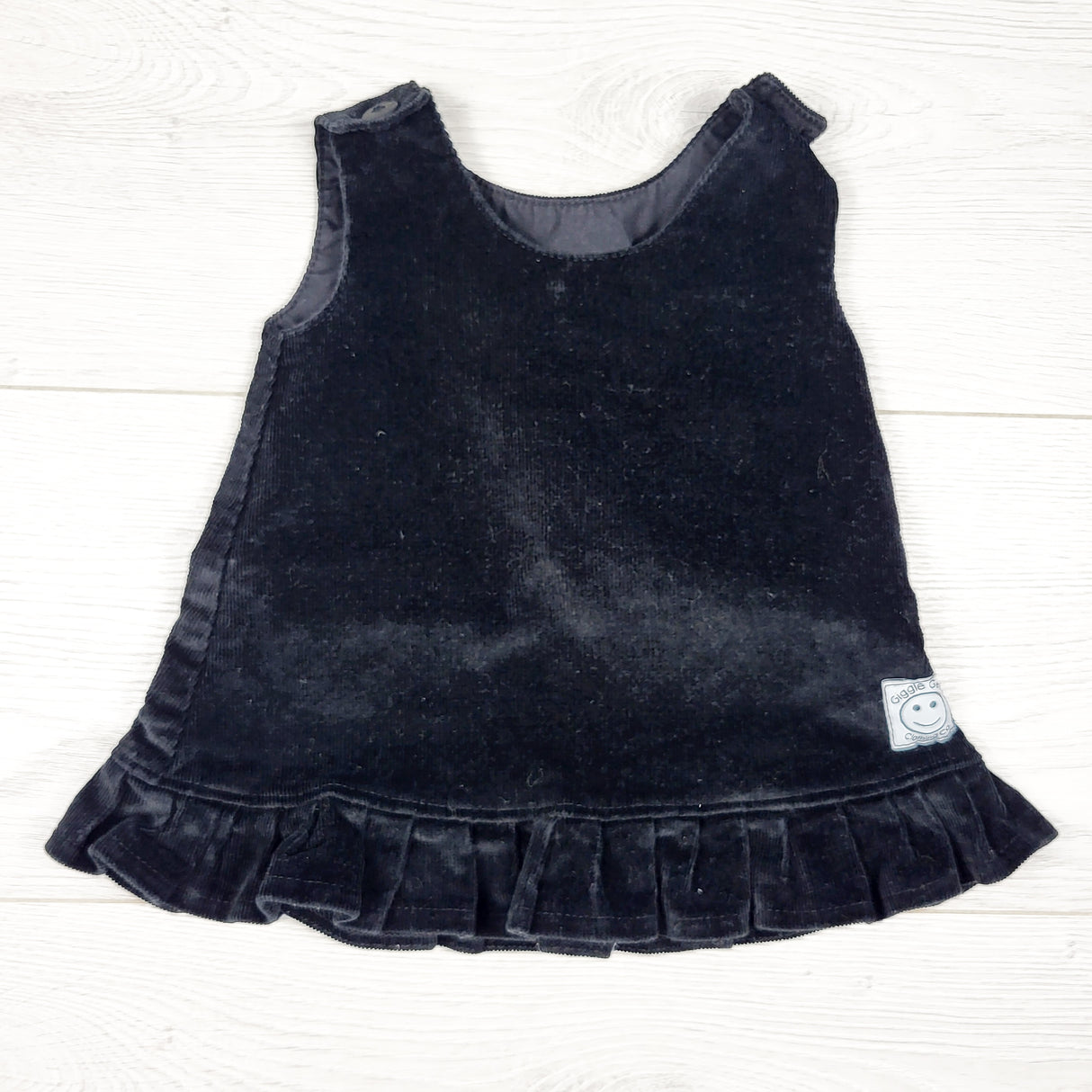 Giggle Gear black handmade corduroy pinafore dress. Size 6 months
