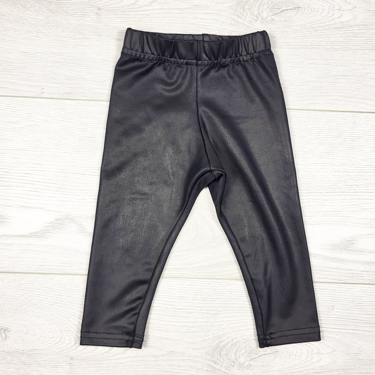 Tiny Button Apparel black handmade faux leather leggings. Size 0-6 months