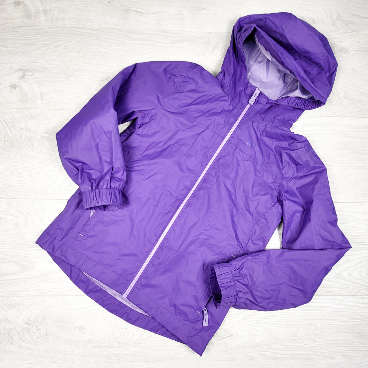 Mountain Warehouse purple hooded rain coat. Size 7/8