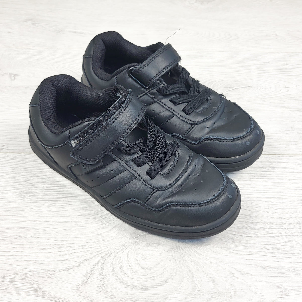 Black running shoes. Youth size 1
