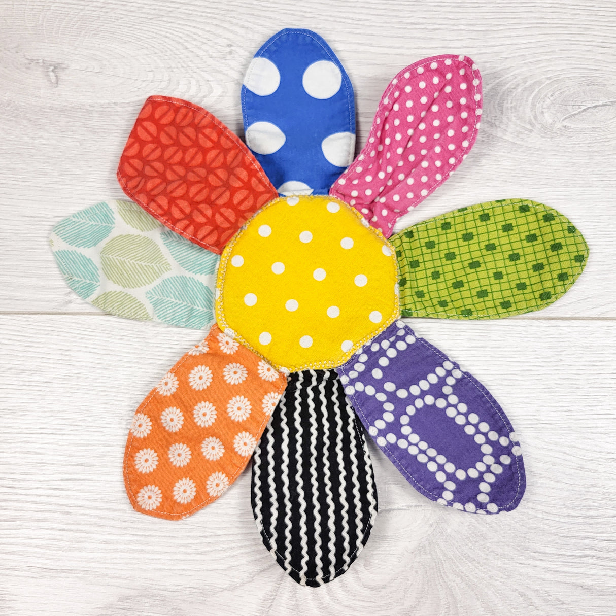 Flower shape taggie style toy