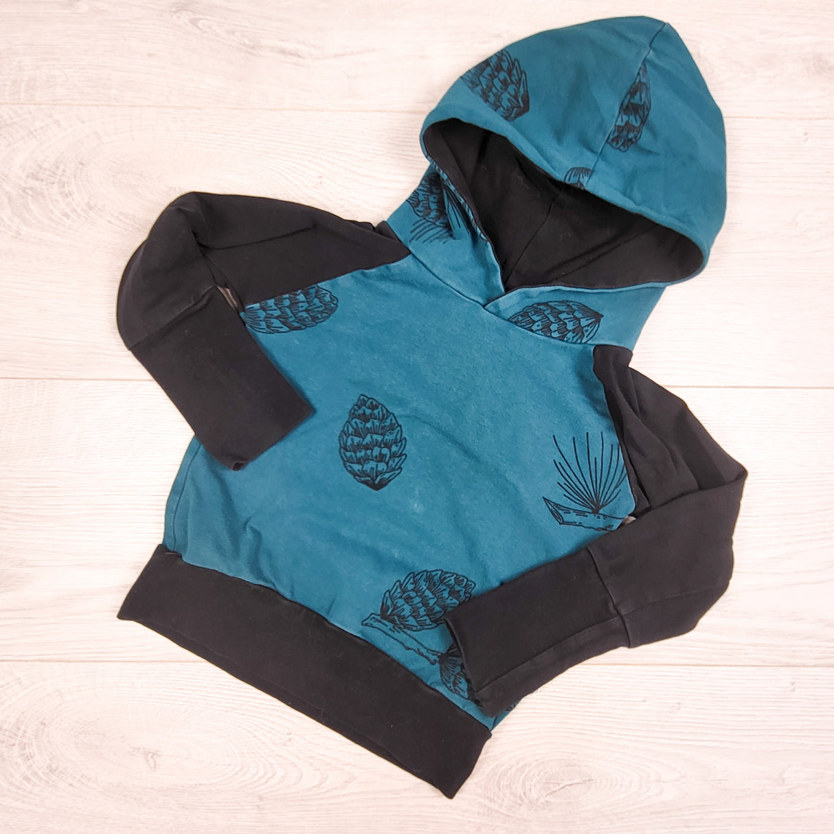 Sugar Sandwich Design Studio teal and black organic cotton acorn hoodie. Size 6 months to 3T