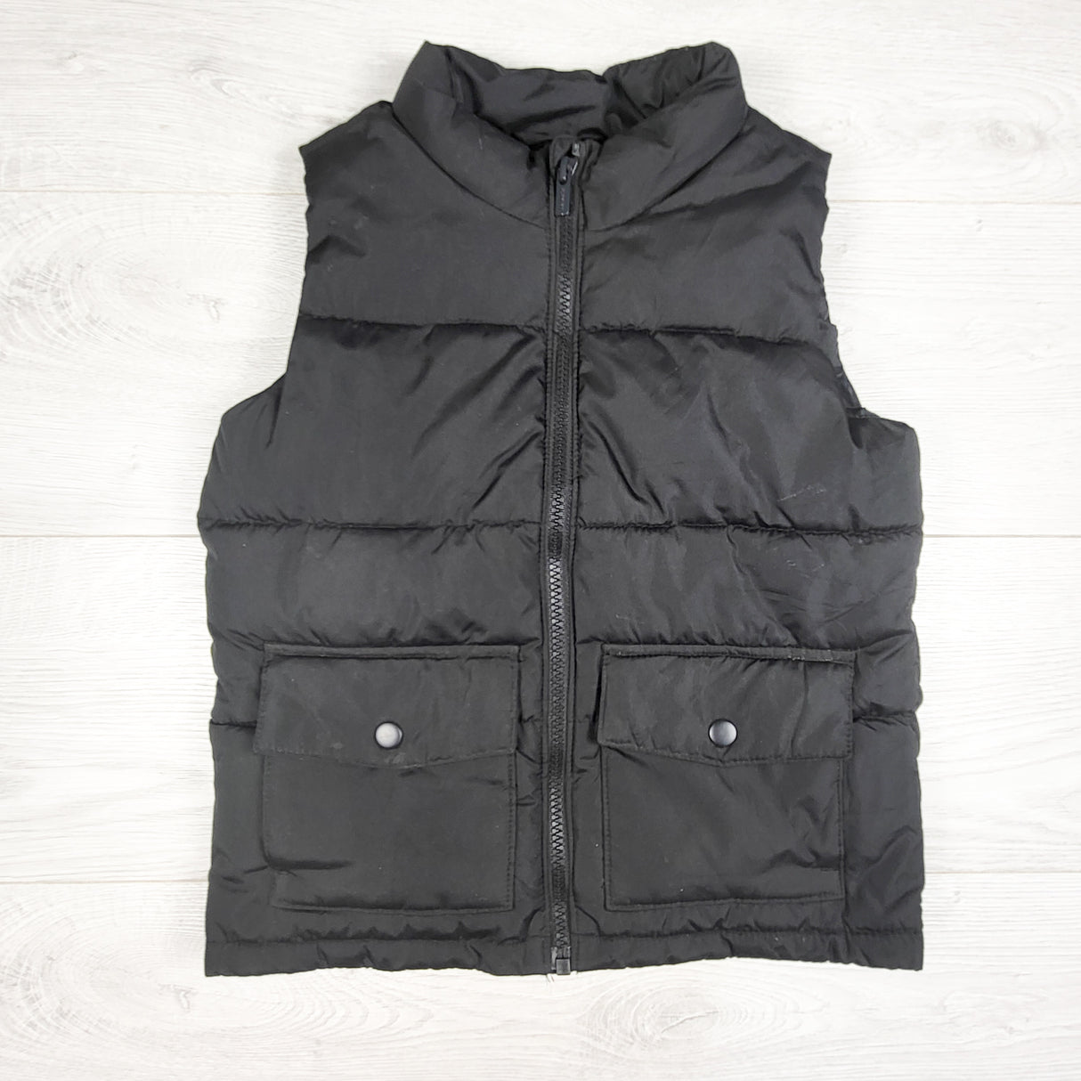 Old Navy black water resistant puffer vest. Size 5T