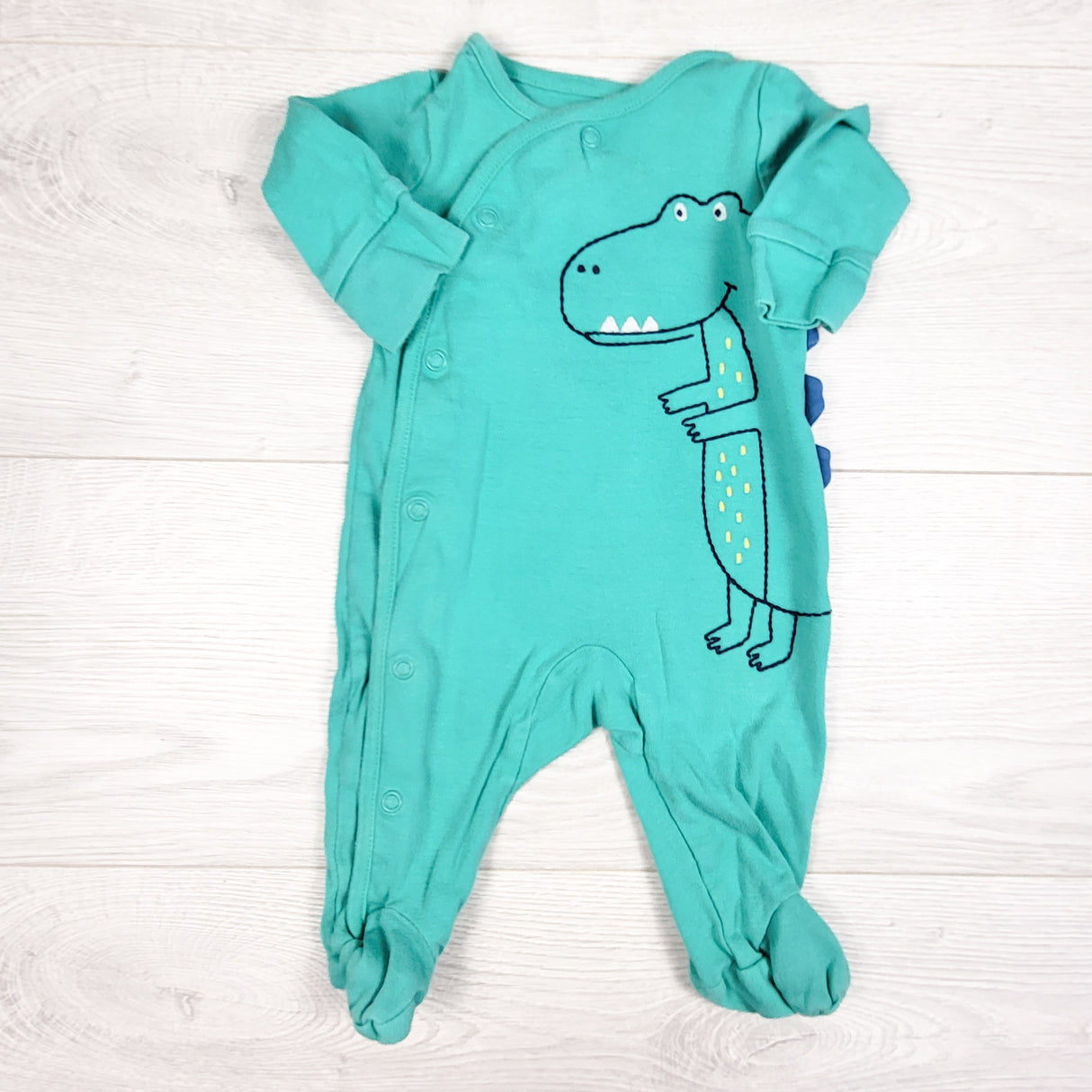 Carters turquoise dinosaur sleeper with scales. Size 3 months