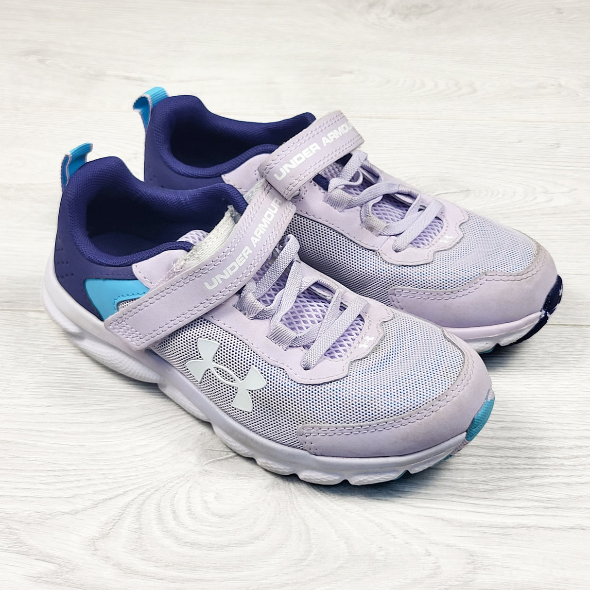 Under Armour purple running shoes. Youth size 2