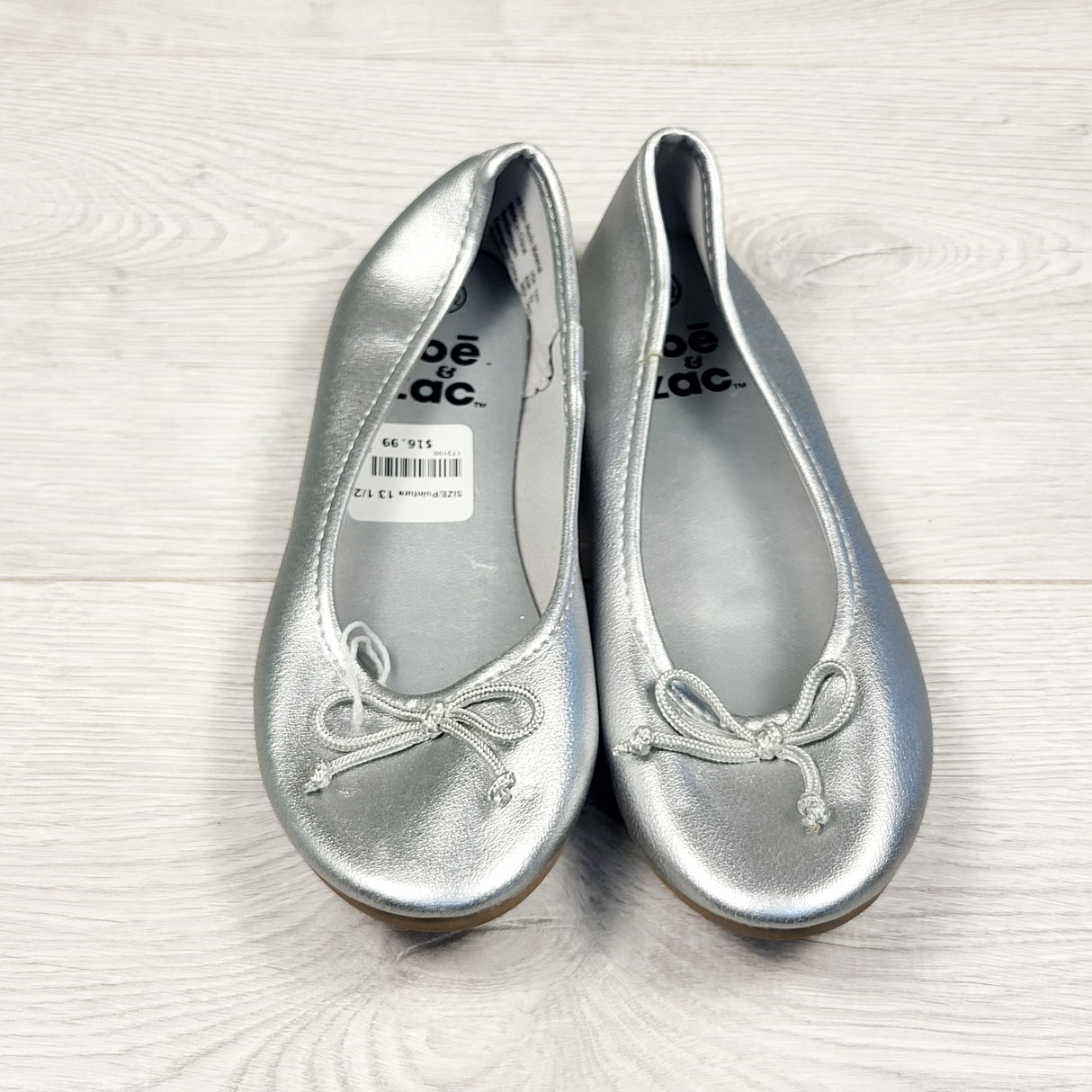 NEW - Zac and Zoe silver bow flats. Size 13.5