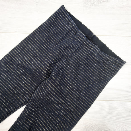 Tea Collection black and gold striped leggings. Size 7