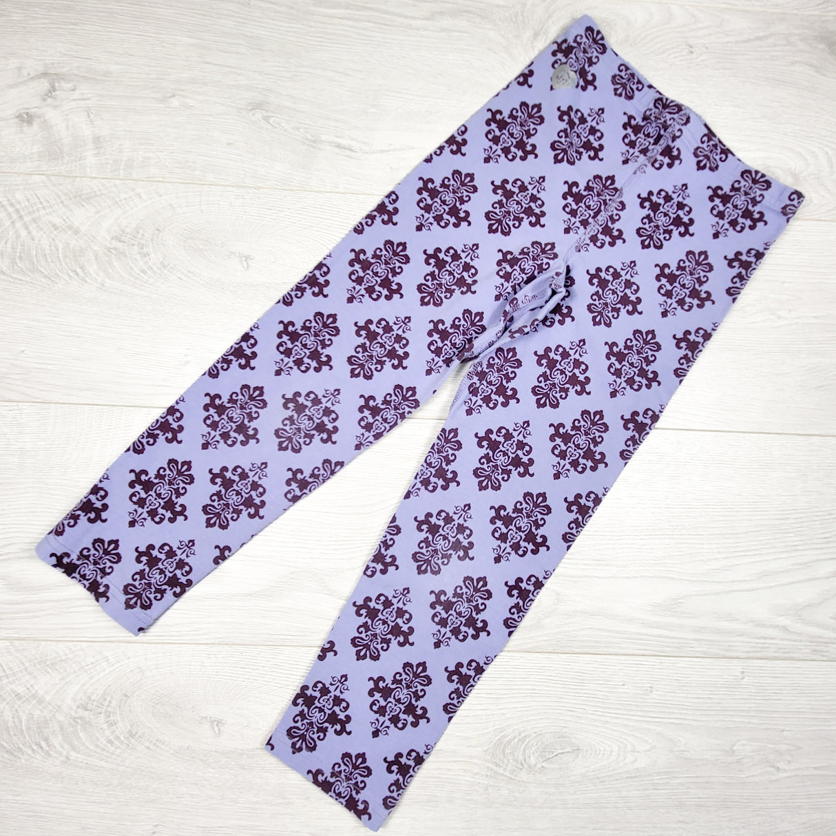 Peekboo Beans purple "Damask" print leggings. Size 6X/7