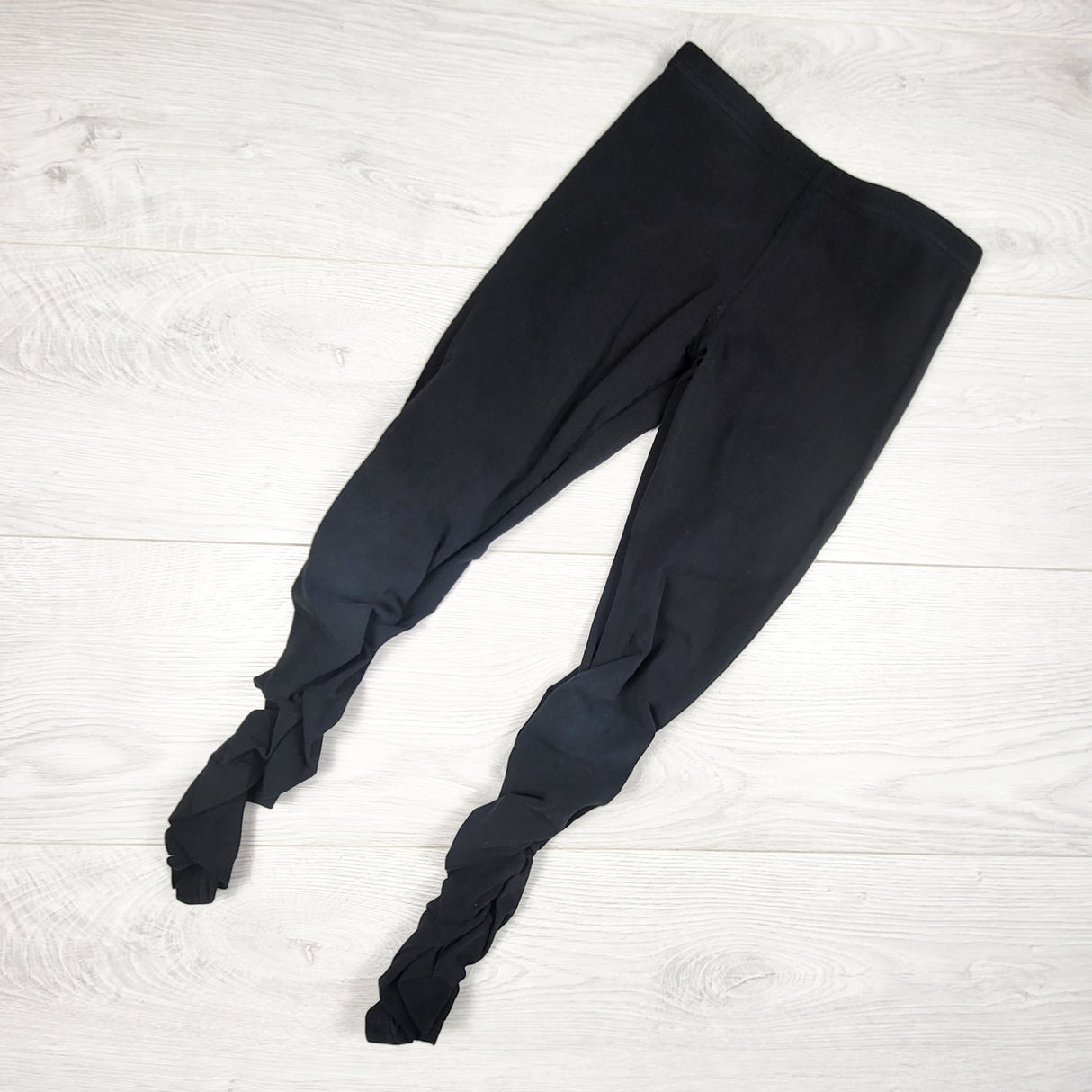 Peekaboo Beans black ruched leggings. Size 7
