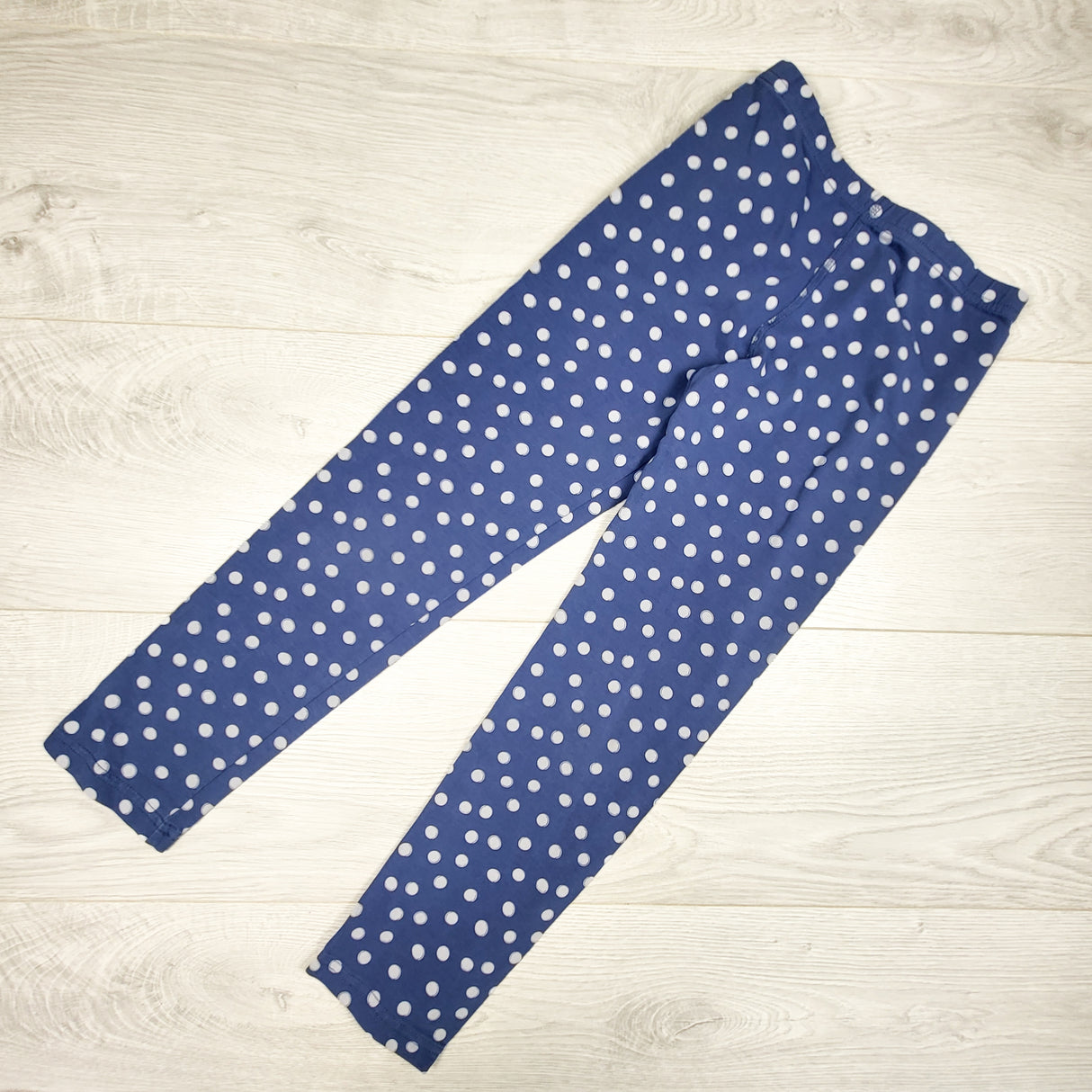 Peekaboo Beans blue polka dot leggings. Size 7