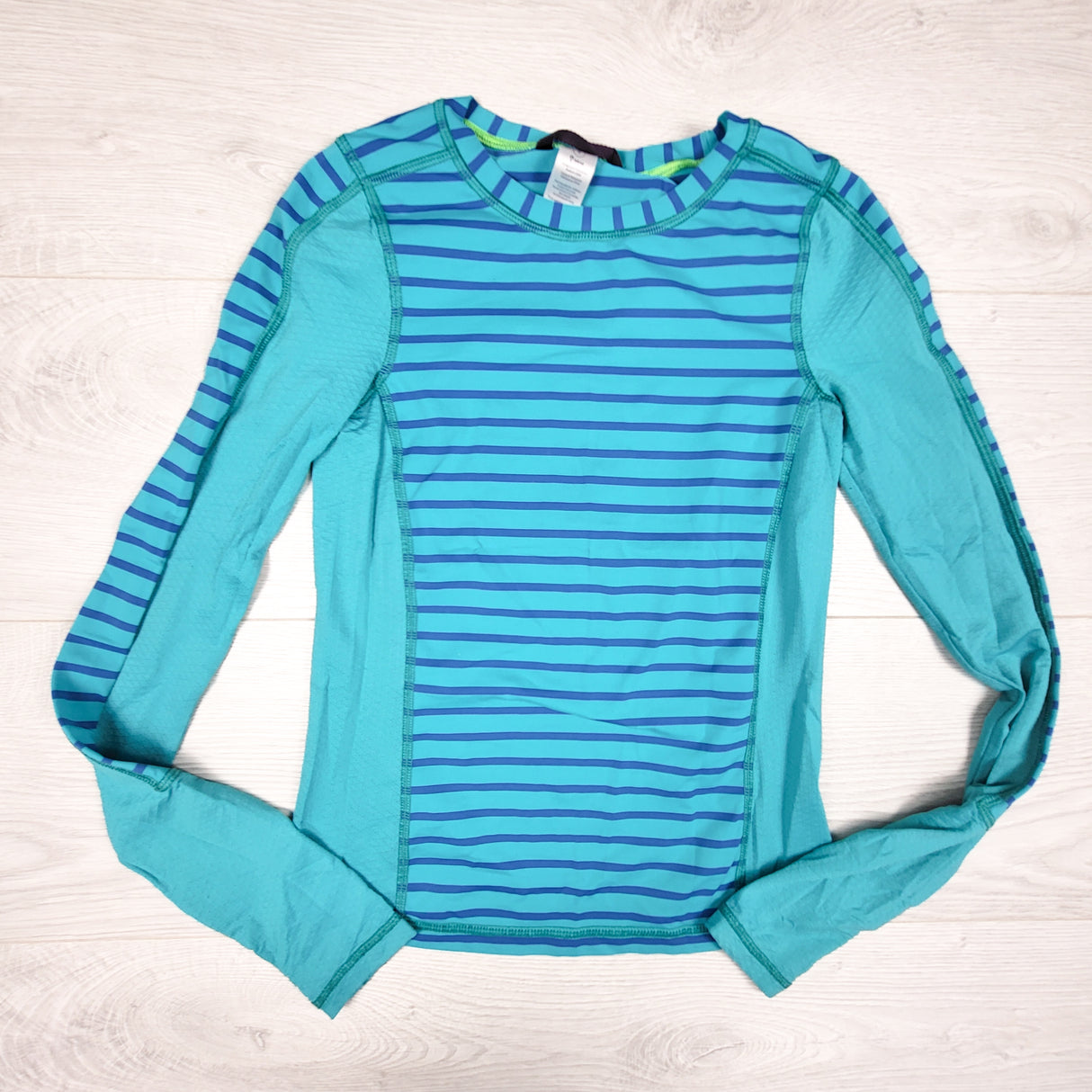 Ivivva (Lululemon) turquoise striped long sleeve active top. Size 8