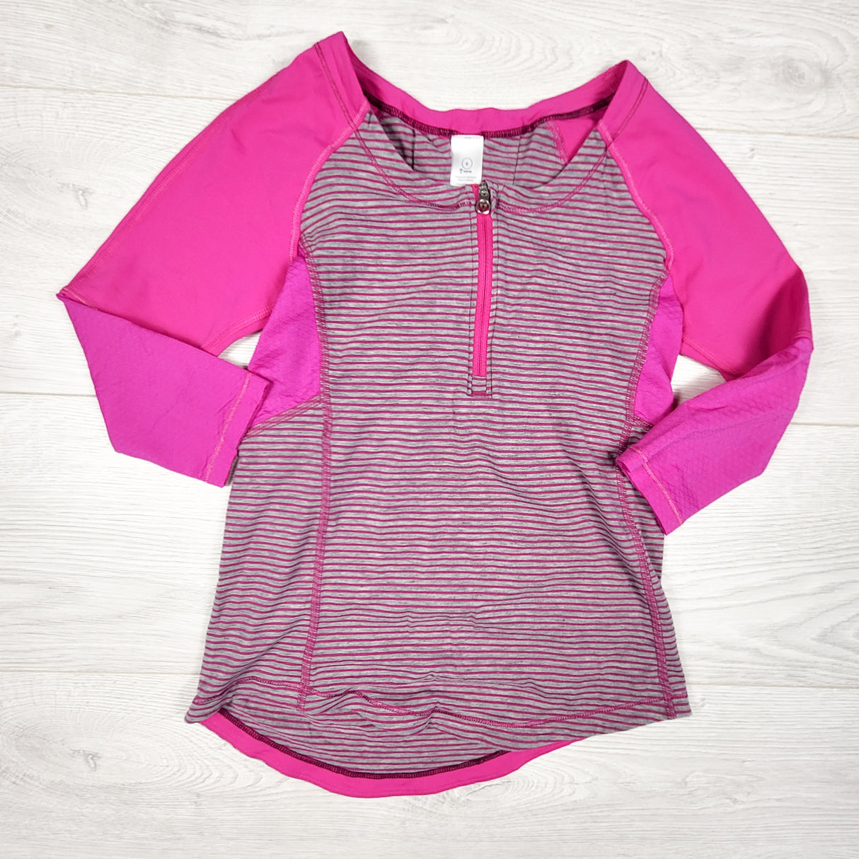 Ivivva (Lululemon) pink striped half zip active shirt. Size 6