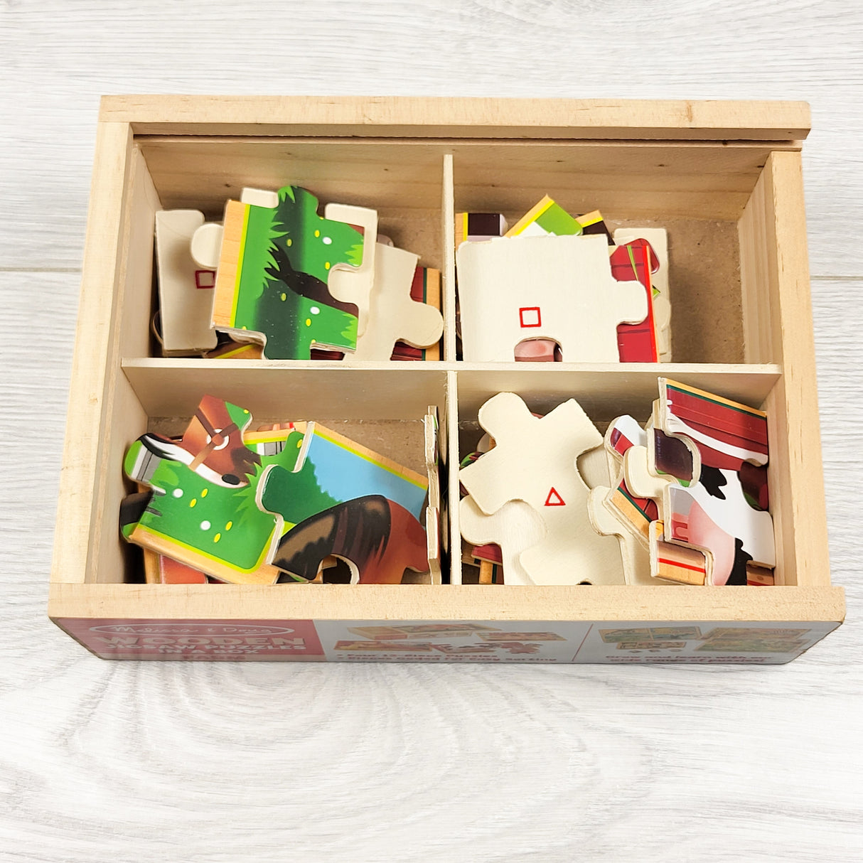 Melissa and Doug wooden farm puzzles (4 total) in box