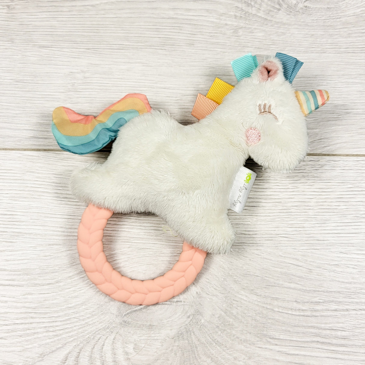 Itzy Ritzy plush unicorn rattle teether