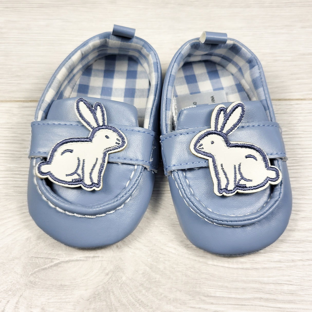 Blue soft soled shoes with bunnies. Size like 6 months