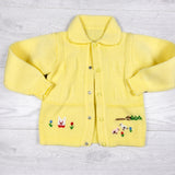 Handmade yellow snap button sweater. Approx 2T
