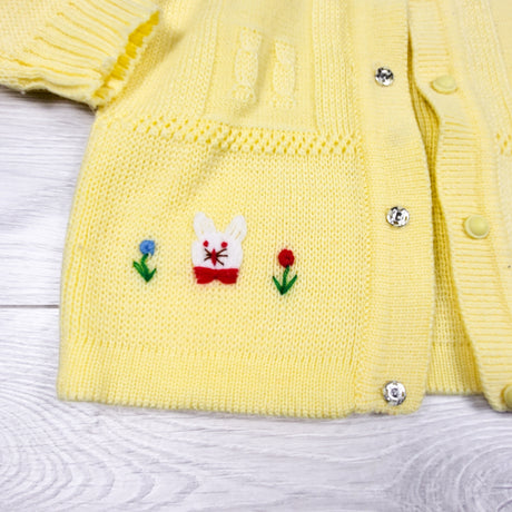 Handmade yellow snap button sweater. Approx 2T