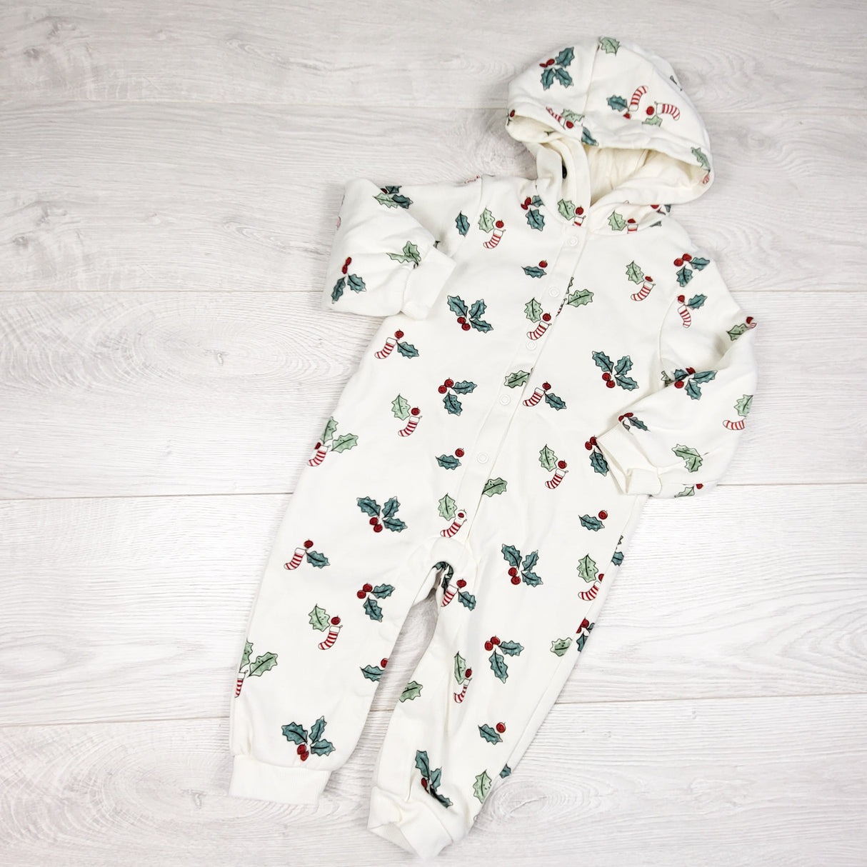 Marks and Spencer white fleece lined sweatshirt romper with stocking and holly. Size 9-12 months