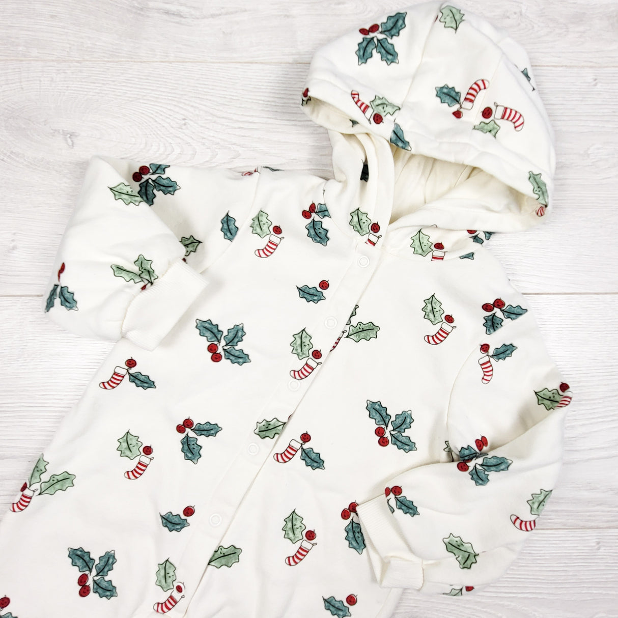 Marks and Spencer white fleece lined sweatshirt romper with stocking and holly. Size 9-12 months