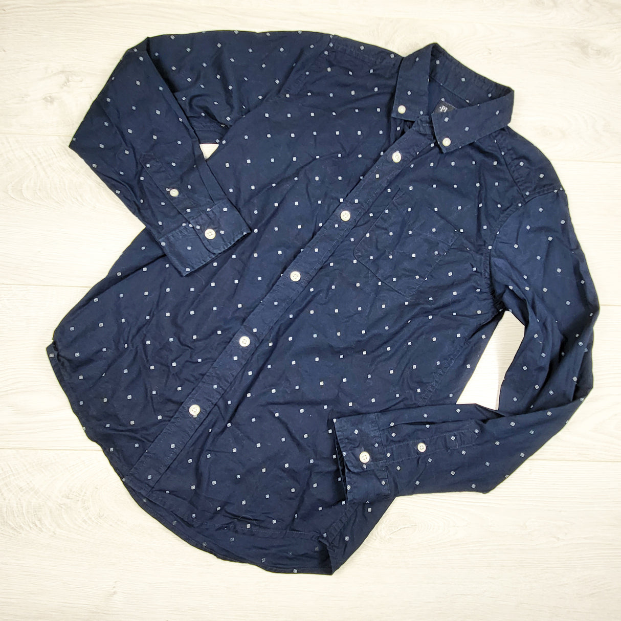 Children's Place navy patterned button up shirt. Size 10/12