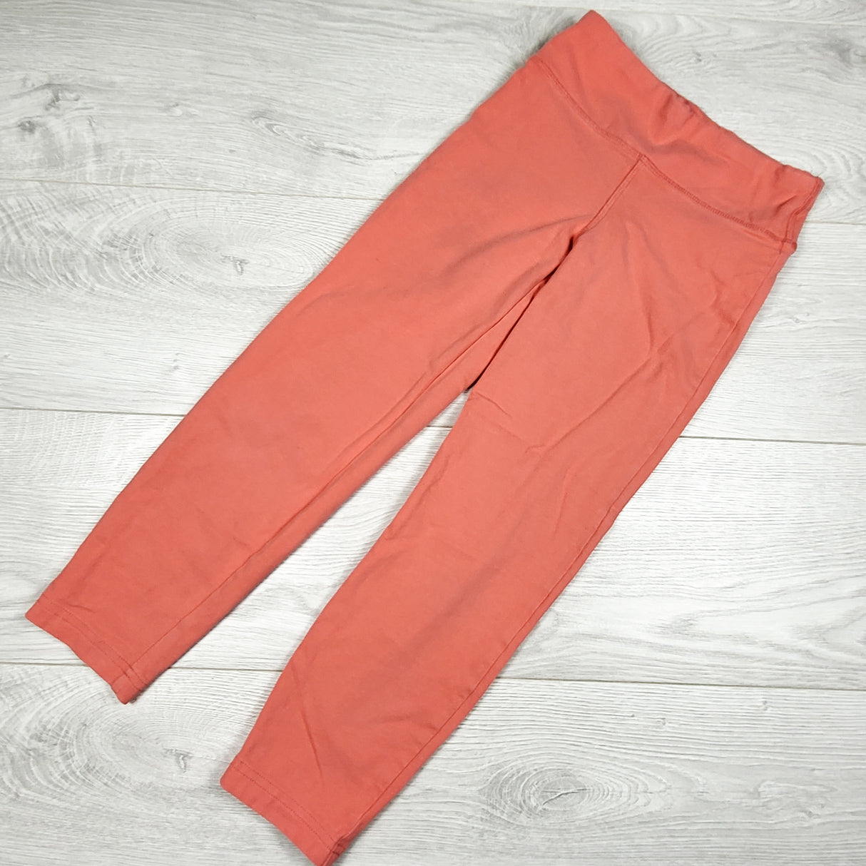 Peekaboo Beans coral leggings. Size 7