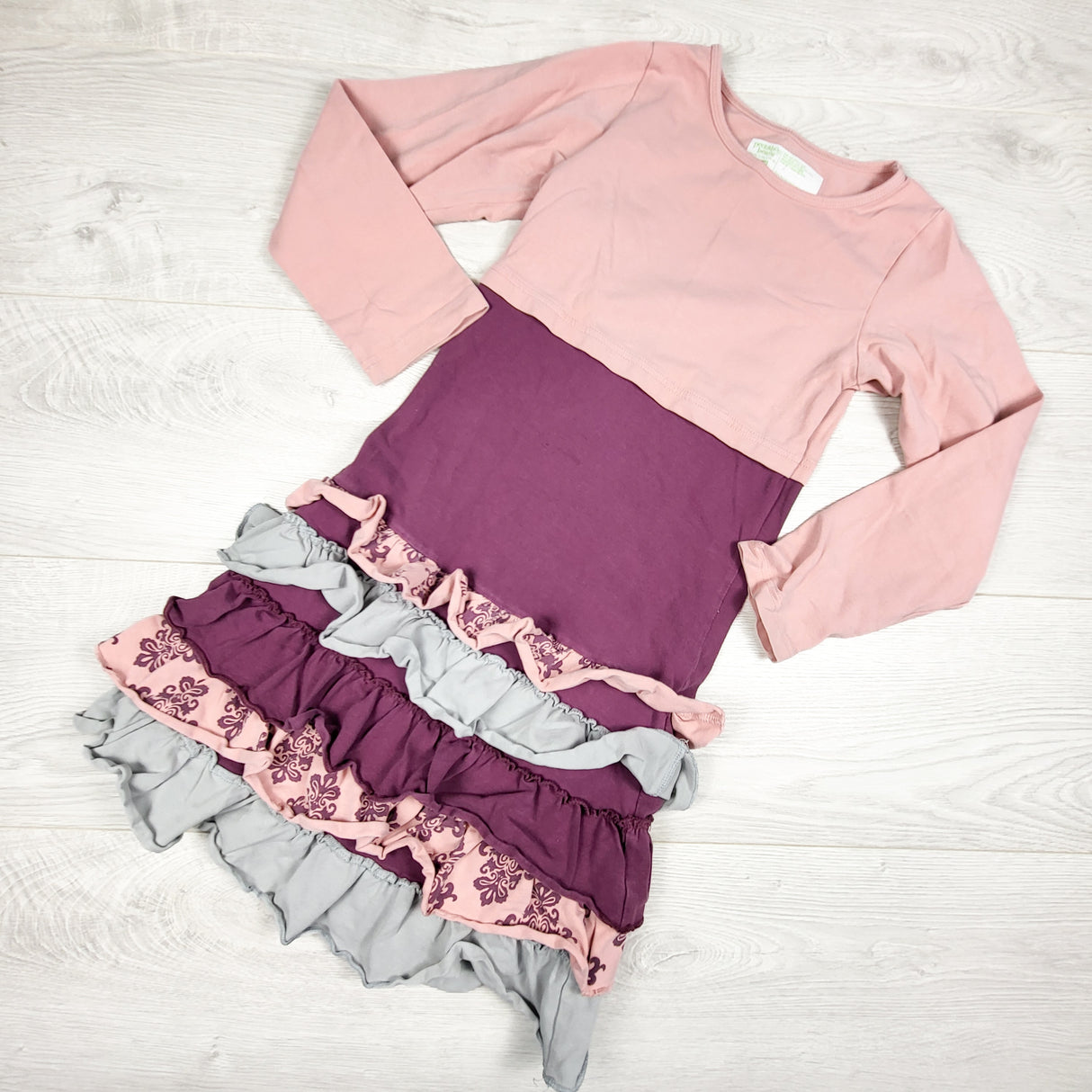 Peekaboo Beans pink and purple ruffle dress. Size 6X/7