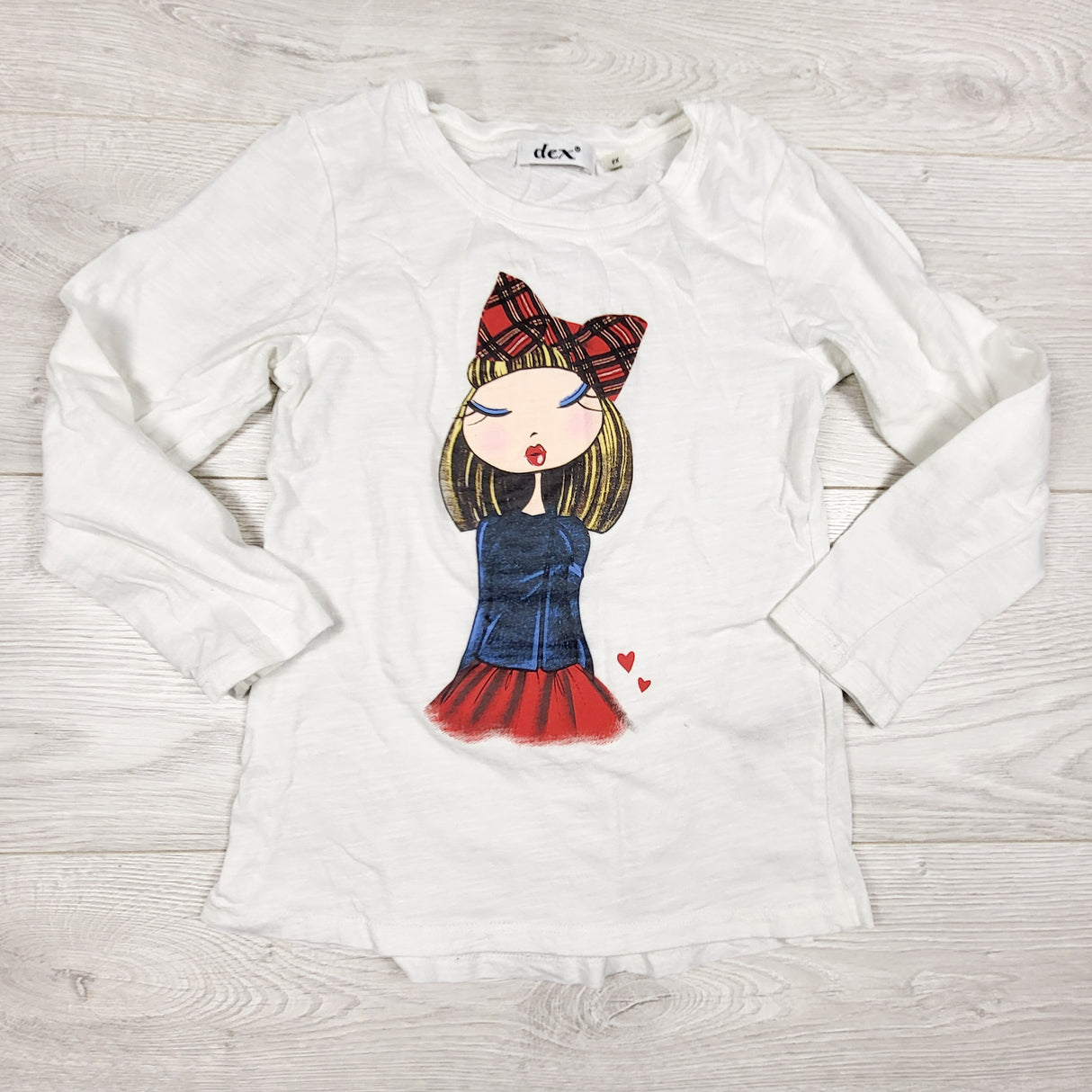 Dex white top with girl in plaid bow. Size 6X
