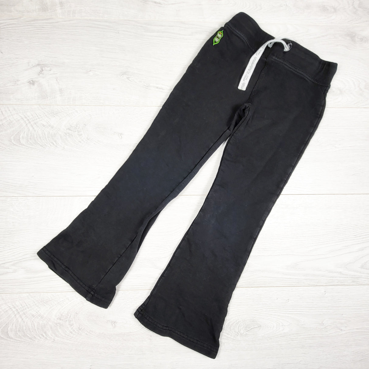 Peekaboo Beans black flare leg joggers. Size 7