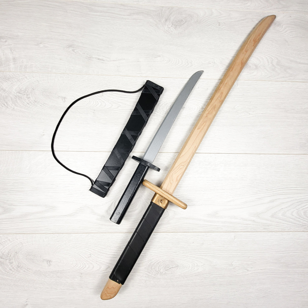 Woodsy brand wooden swords (sorry, shipping)