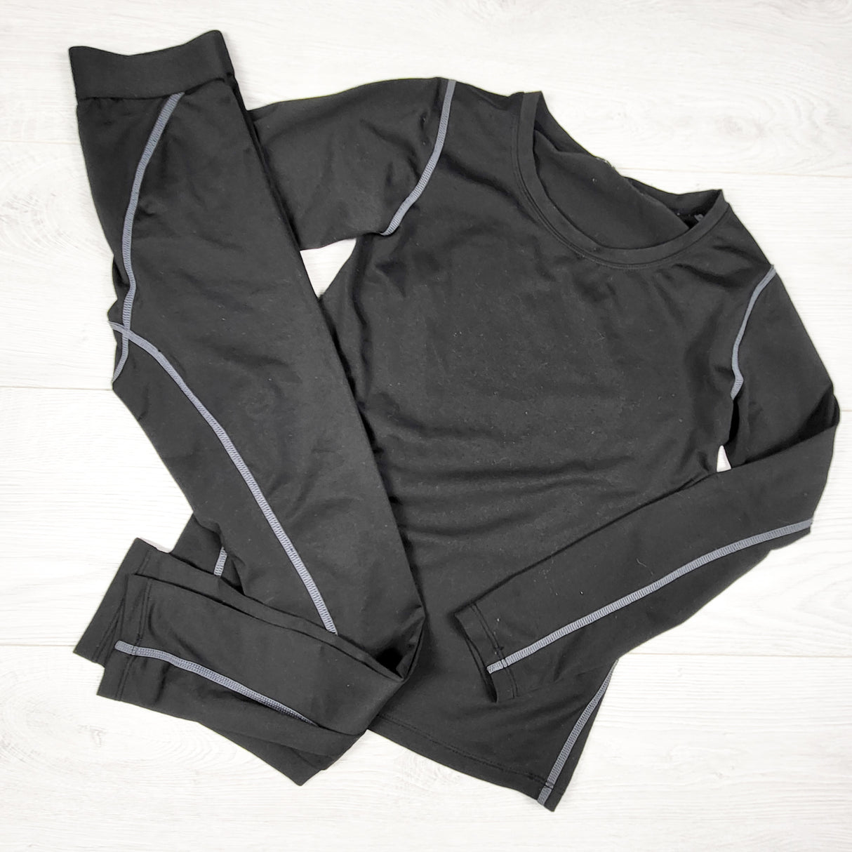 Black 2pc base layer set.  Approx size 8